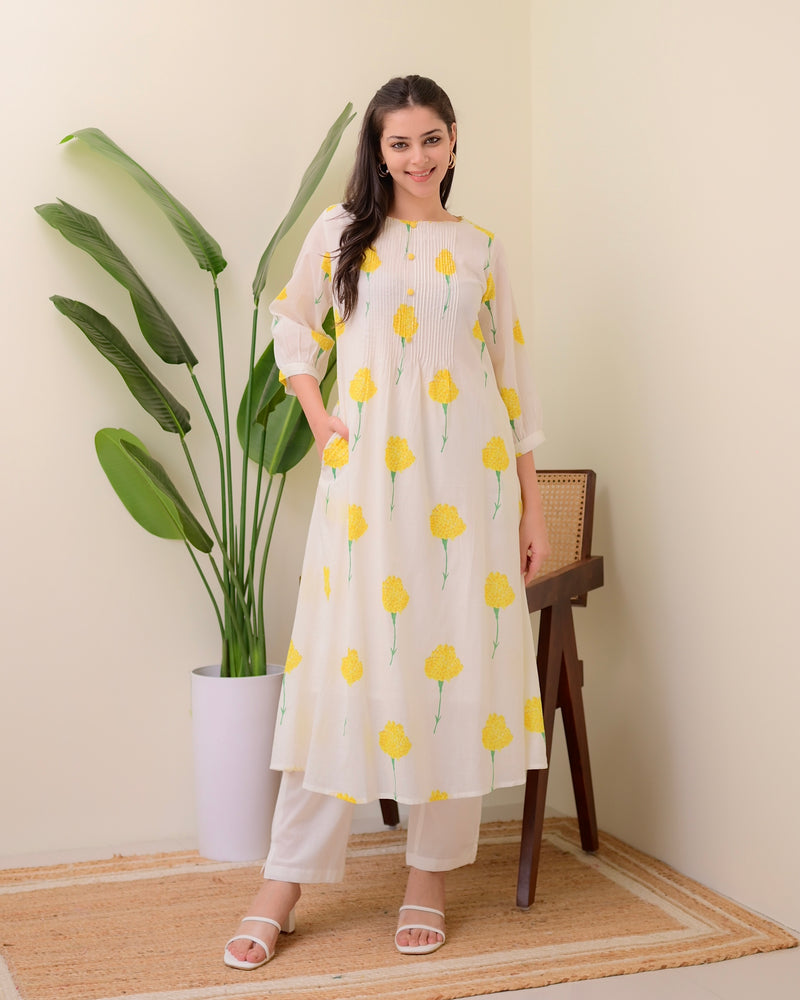 White Yellow Floral Pintex A Line Mul Cotton Kurta Set