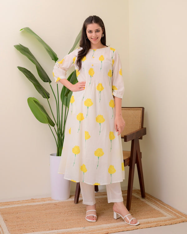 White Yellow Floral Pintex A Line Mul Cotton Kurta Set