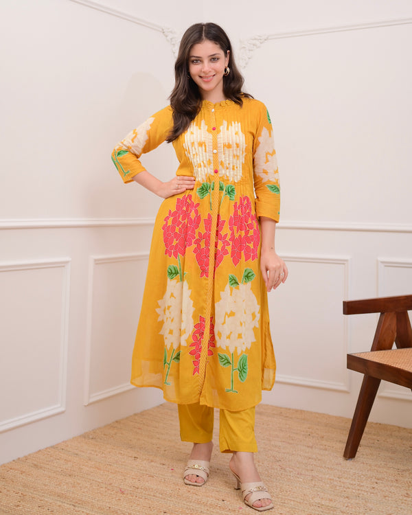 Yellow Bloom Pintex Mul Cotton A Line Kurta Set