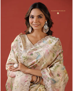 Ivory Multi Floral Tussar Saree With Mirror and Aari Work
