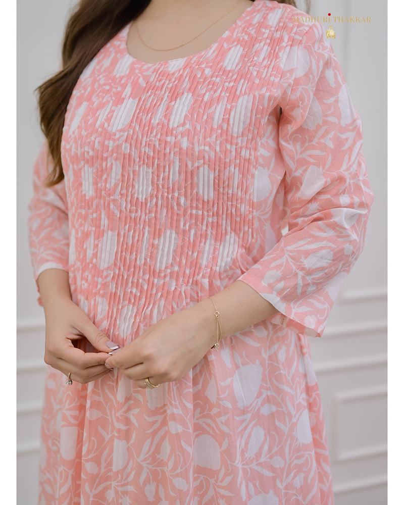 Peach Floral A Line Mul Cotton Kurti
