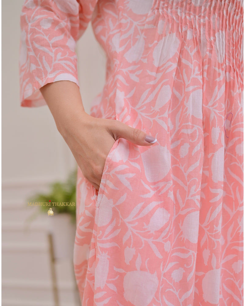 Peach Floral A Line Mul Cotton Kurti
