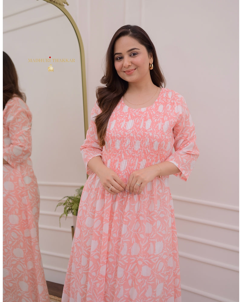 Peach Floral A Line Mul Cotton Kurti
