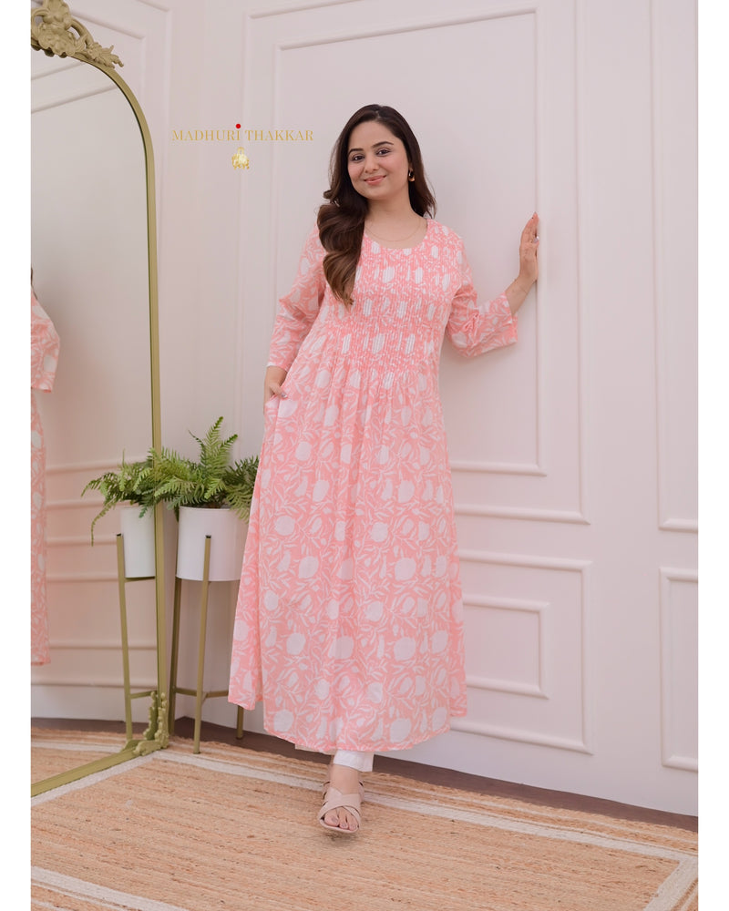 Peach Floral A Line Mul Cotton Kurti