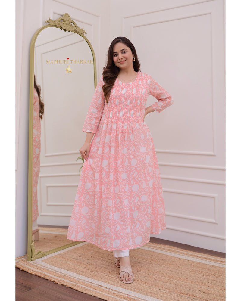 Peach Floral A Line Mul Cotton Kurti